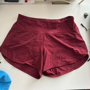 Size 4 mid rise Lulu Lemon Speed Up 4”